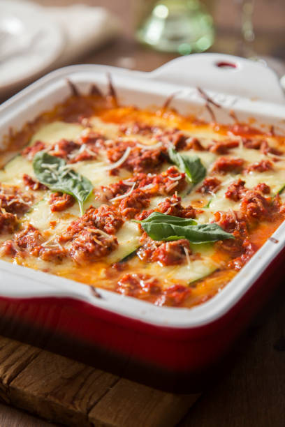 A healthy gluten free zucchini lasagna with no noodles only vegetables, meat, and cheese.