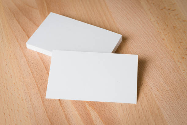 istock Business card blank on wood background 640906458