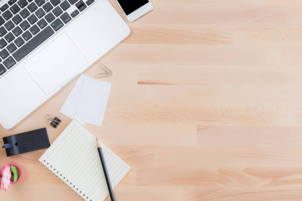 istock Office table with notepad, computer, pencil and business cards. View from above with copy space 640907988