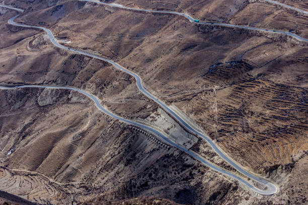 istock Winding road on Tibet Plateau 640910302