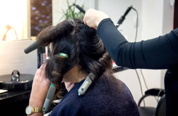 istock Young Woman Getting Hair Styled 640912074