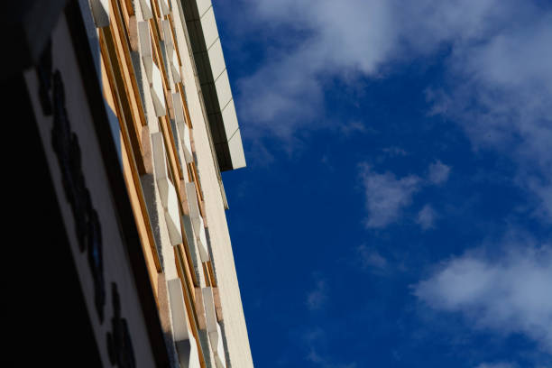 istock Office building in the blue sky 640912670