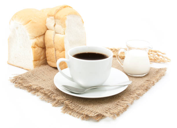 istock Beautiful breakfast with coffee and bread isolated 640916654