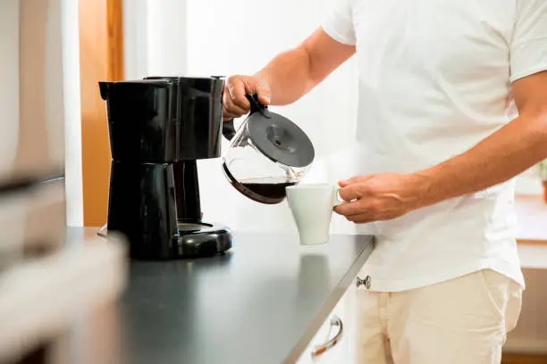 Photo of Man drinking coffee in the morning