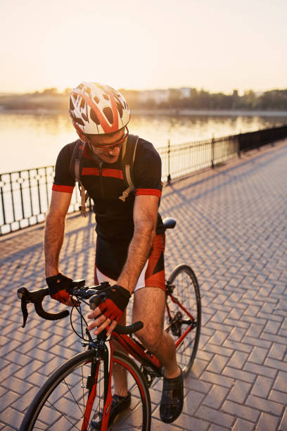 istock Young and energetic cyclist in the park 640921626