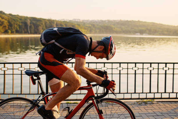 istock Young and energetic cyclist in the park 640921636