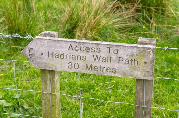 istock Wooden Sign indicating the Access of Path 640923492