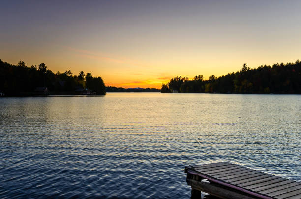 istock Beautiful Sunset over a Mountain Lake 640923624