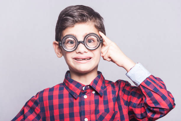 istock Funny little genius having an idea 640925696