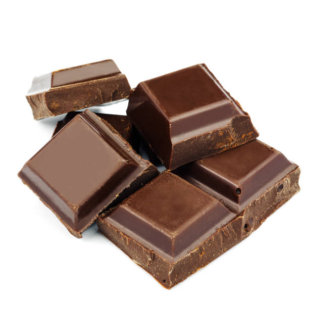 istock Dark chocolate cubes isolated on white background. 640928142