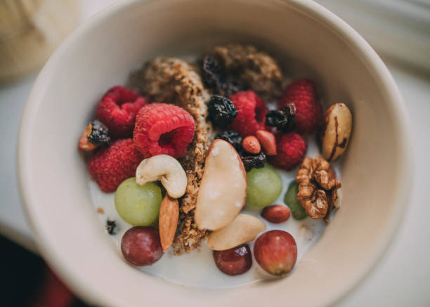 Bowl of Cereal A healthy bowl of cereal and fruit! bran flakes stock pictures, royalty-free photos & images