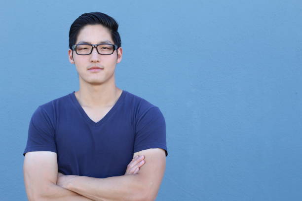 istock Young Asian man looking at the camera 640930830
