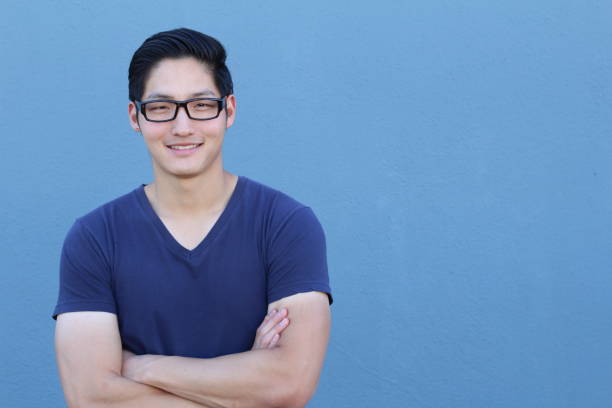 istock Asian man with glasses smiling and laughing 640931218