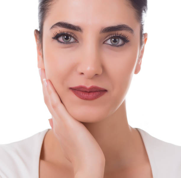 istock Beautiful Girl Touching Her Face 640934698