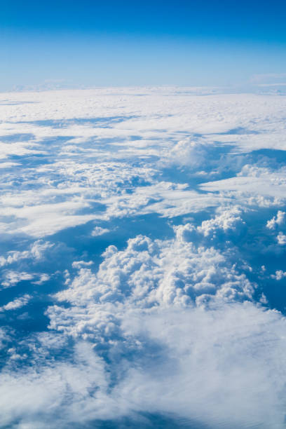istock Light and shadows in the sky with clouds seen from an airplane. 640934938