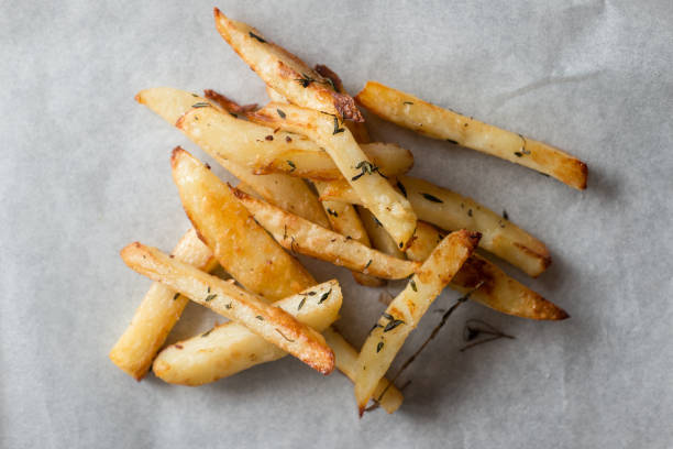 istock Baked Fries on Gray Background 640936146