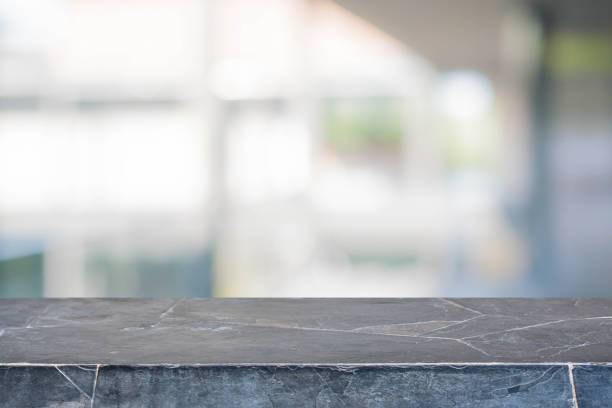 istock Stone table top and blurred bokeh background with vintage filter - can used for display or montage your products. 640940310