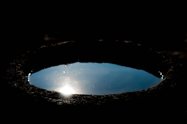 The last rays of the sun are reflected in an ancient stone bowl.