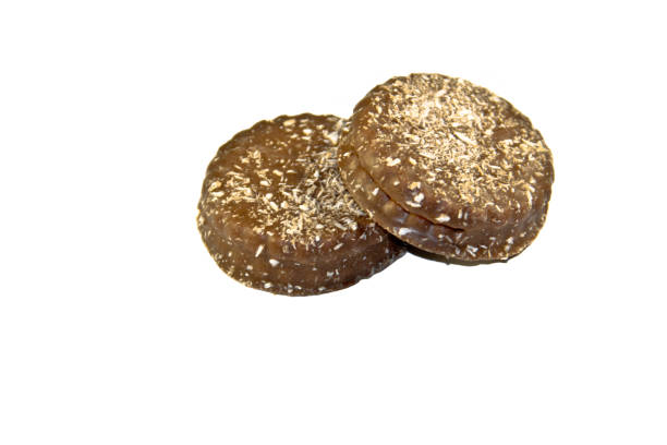 istock Chocolate cookies with coconut shaving isolated on the white background 640940530