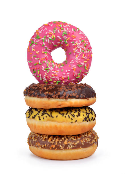 istock Donuts with colorful sugar icing isolated on white background. 640942554