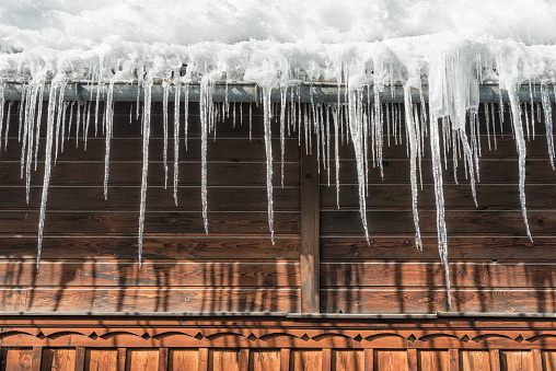 Icicles hanging from roof. Nikon D810. Converted from RAW.