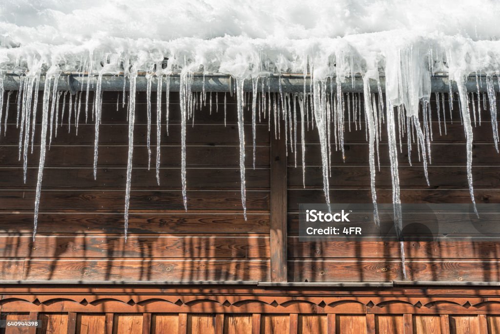 Icicles hanging from Roof Icicles hanging from roof. Nikon D810. Converted from RAW. Ice Stock Photo