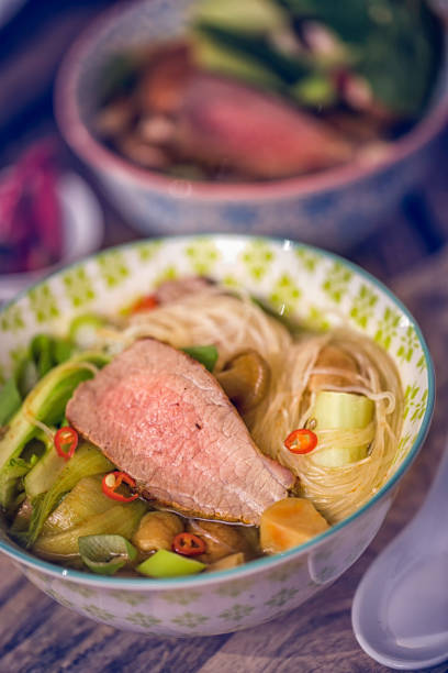 istock Asian Glass Noodle Soup with Beef and Pak Choi 640947828