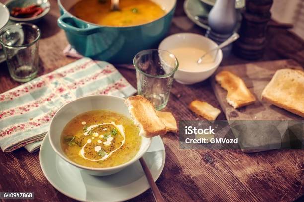 Eating Delicous Chicken Soup With Carrots And Parsnips Stock Photo - Download Image Now