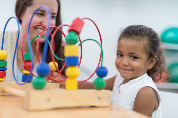 istock Exercising kids in physical therapy clinic 640947970