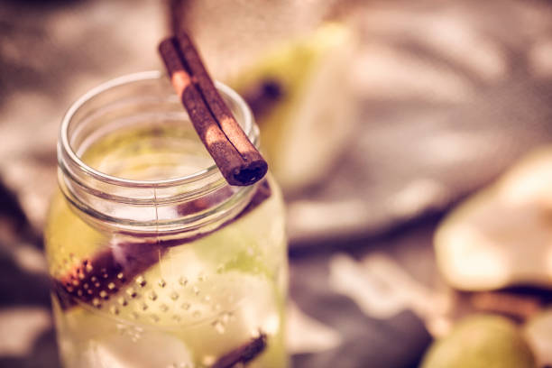 Apple Chips, thin slices of dehydrated and baked apple, sprinkled with cinnamon powder, easy recipe for a healthy snack.