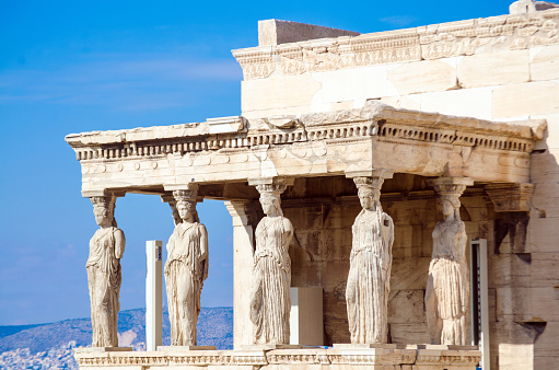 Temple of Erectheum with the Caryatids statues at Acropolis, Athens city, Greece.