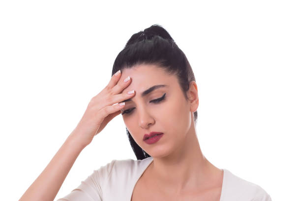 istock Young woman keeps hands for head 640950274
