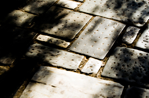 Texture of a pavement. Sunlight effect.