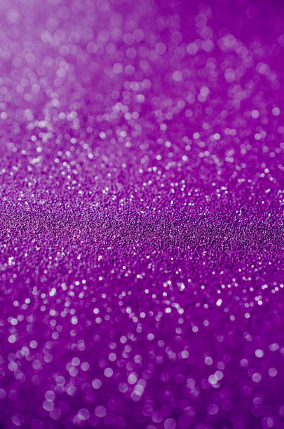 istock Purple sparkling glitter background with copy space 640953698