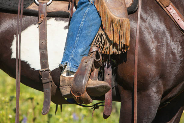 istock Cowboy Sitting On His Horse 640957574
