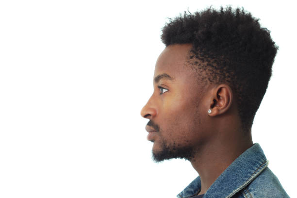 istock young man portrait studio white background face profile close-up twenty 640958886