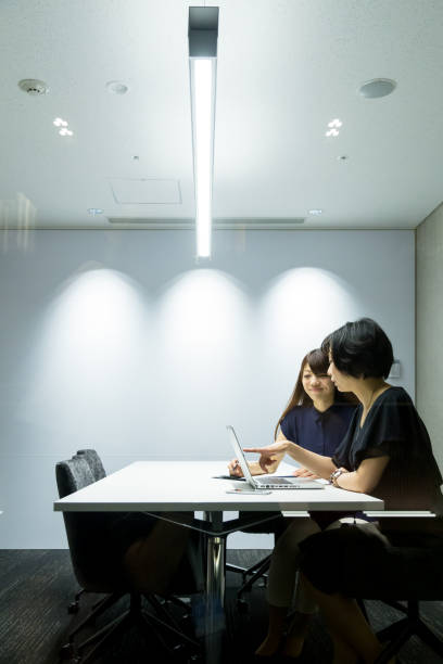 istock Women Working Together in Conference Room 640959804