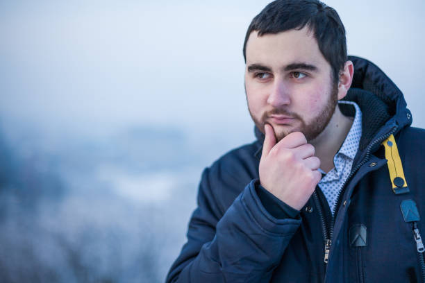 istock Portrait of a young thoughtful man 640960338