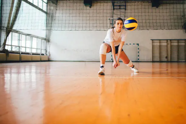 Young women playing volleyball. They are team and have training. You can find video files from same shooting in our portfolio.