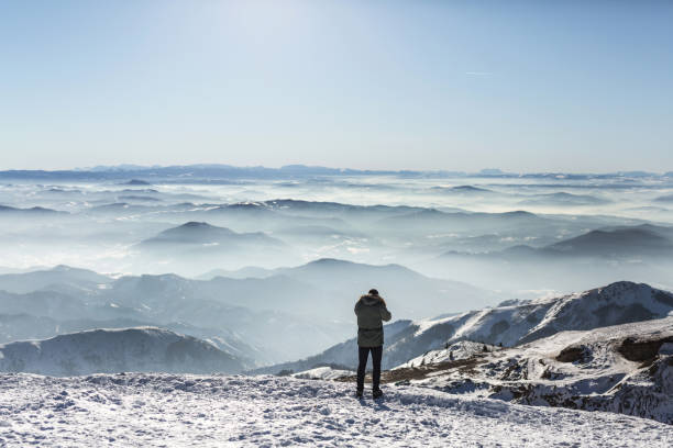 istock Taking a photo of a mountain peak 640962720