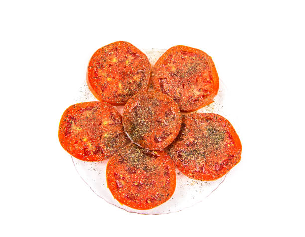 istock Tomatoes Fresh Sliced and Seasoned 640963218