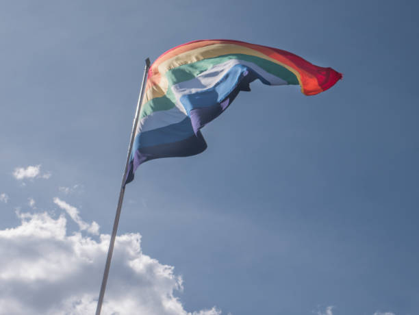 istock Flag of Cusco waving against blue sky 640963776