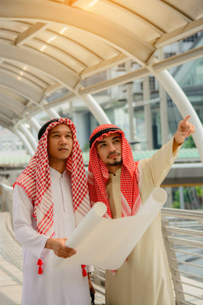 istock Arab Business people having consultanting about new project with city background. 640966962