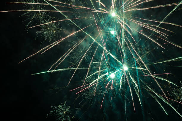 istock fireworks in the black sky with long trail 640972536