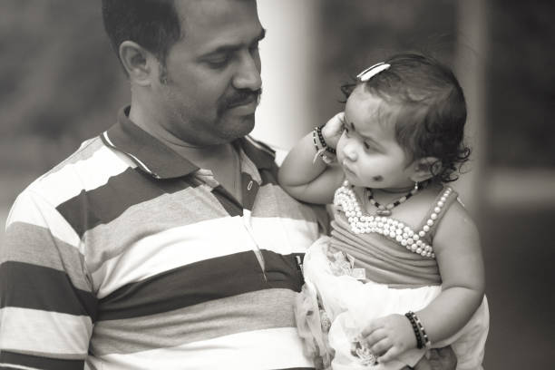 istock Young Father Carrying Baby 640972590