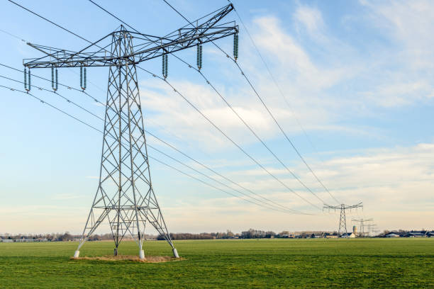 istock Row of power pylons in a rural Dutch landscape 640972792