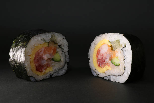 istock Japanese seafood roll sushi on black 640974062
