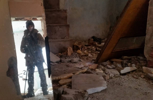 istock Photographer shooting in a ruined abandoned apartment 640975232