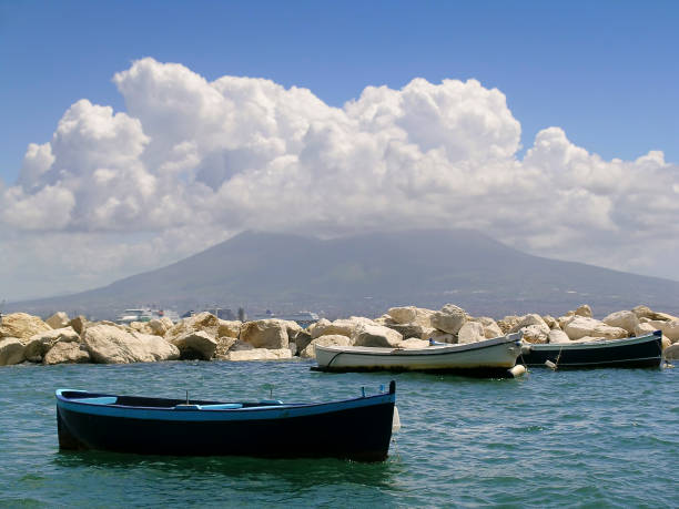Little boat and Vesuvio stock photo