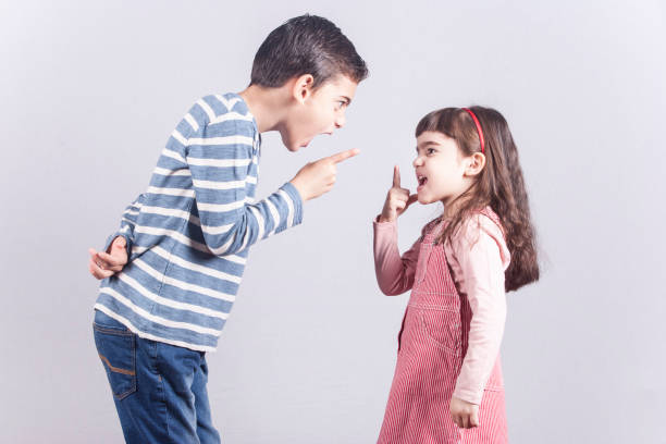 istock Brother and sister arguing 640985906
